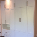 wall bed and cabinets with shaker doors